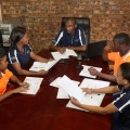 Shirley Mbazima strategises with the UAS Team.JPG